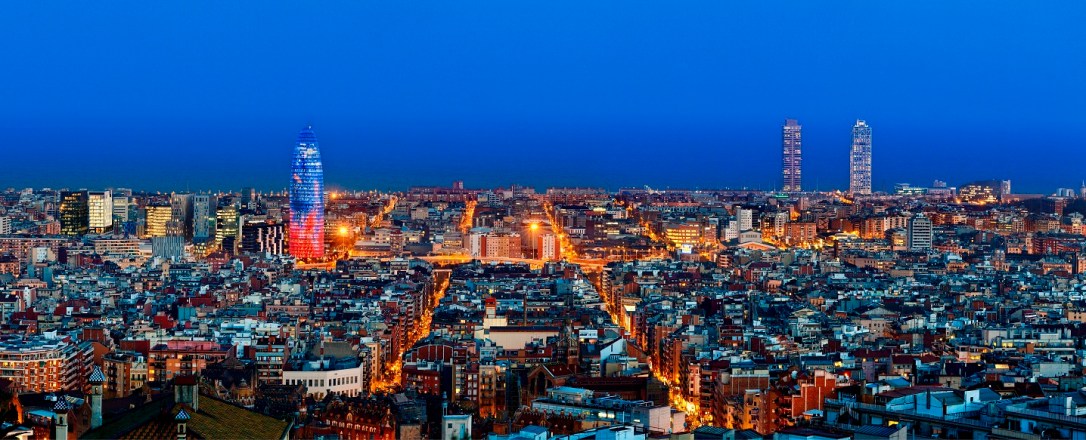 Barcelona skyline with Torre Agbar at twilight, Barcelona, Spain